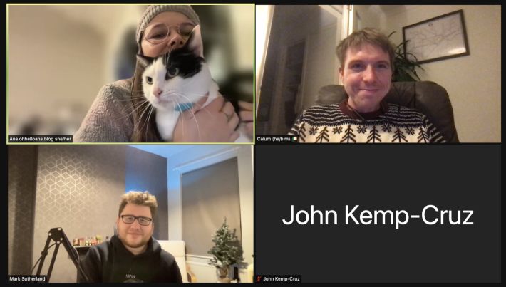 Four attendees at HWC Europe/London, plus one cat