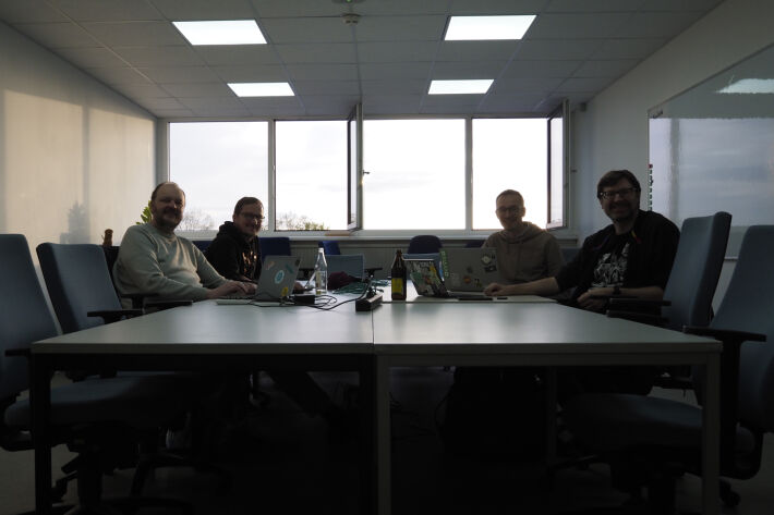 The crew of Homebrew Website Club Nuremberg 2024-04-10. 4 people sitting around a table.