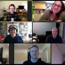 Screenshot of the Zoom video conferencing app with 11 faces smiling at the camera.