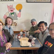 IndieWeb San Francisco community members and a special guest from out of town sitting at a table in a cafe