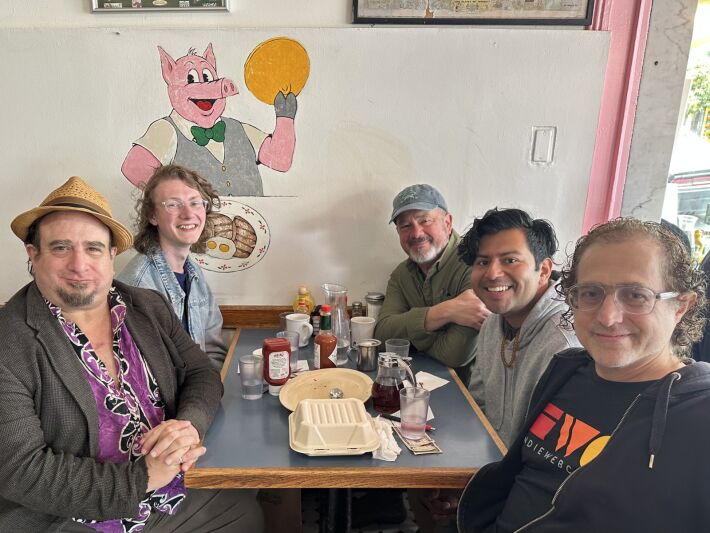 IndieWeb San Francisco community members and a special guest from out of town sitting at a table in a cafe